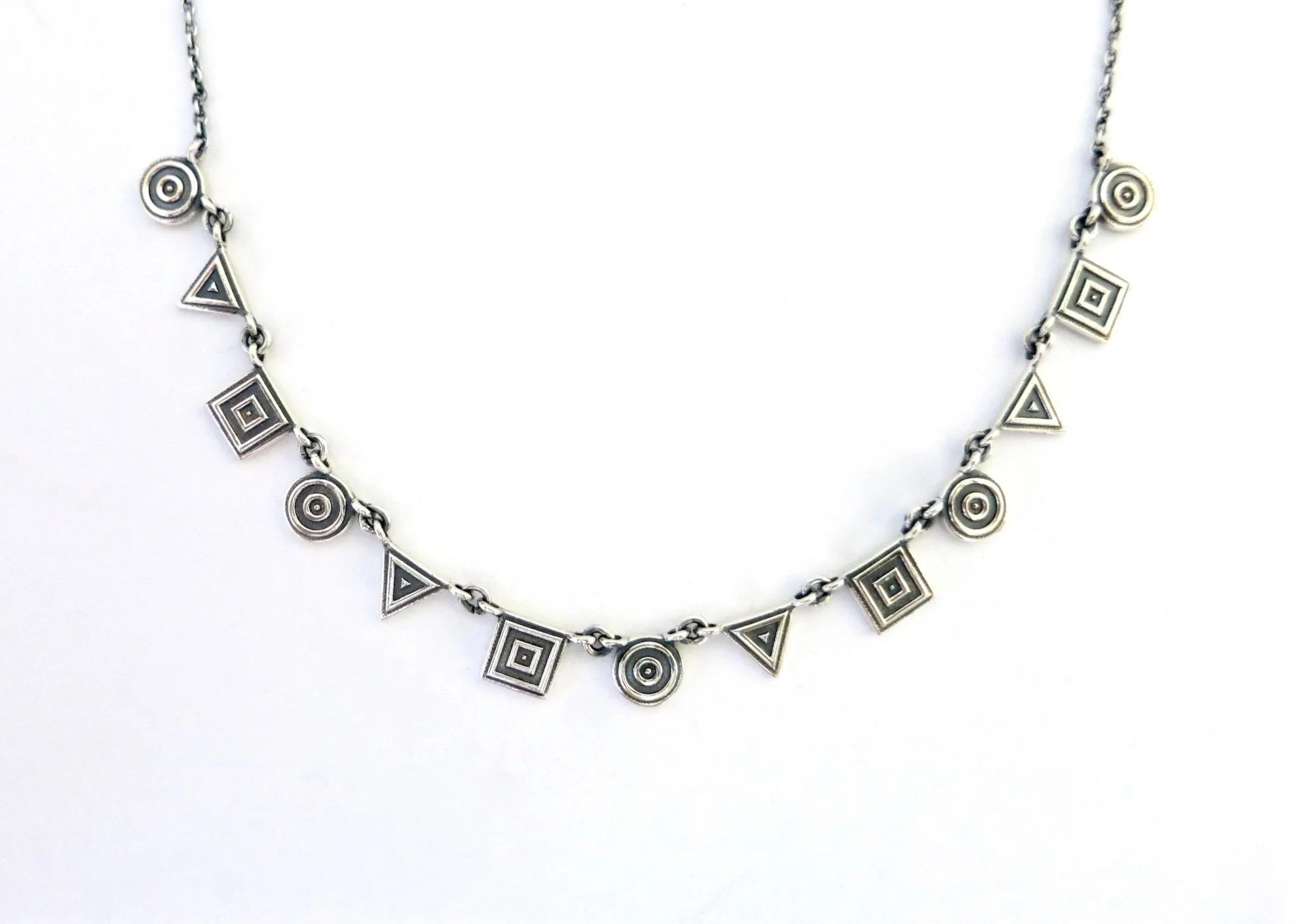 Chic, neo-tribal, geometric medley necklace