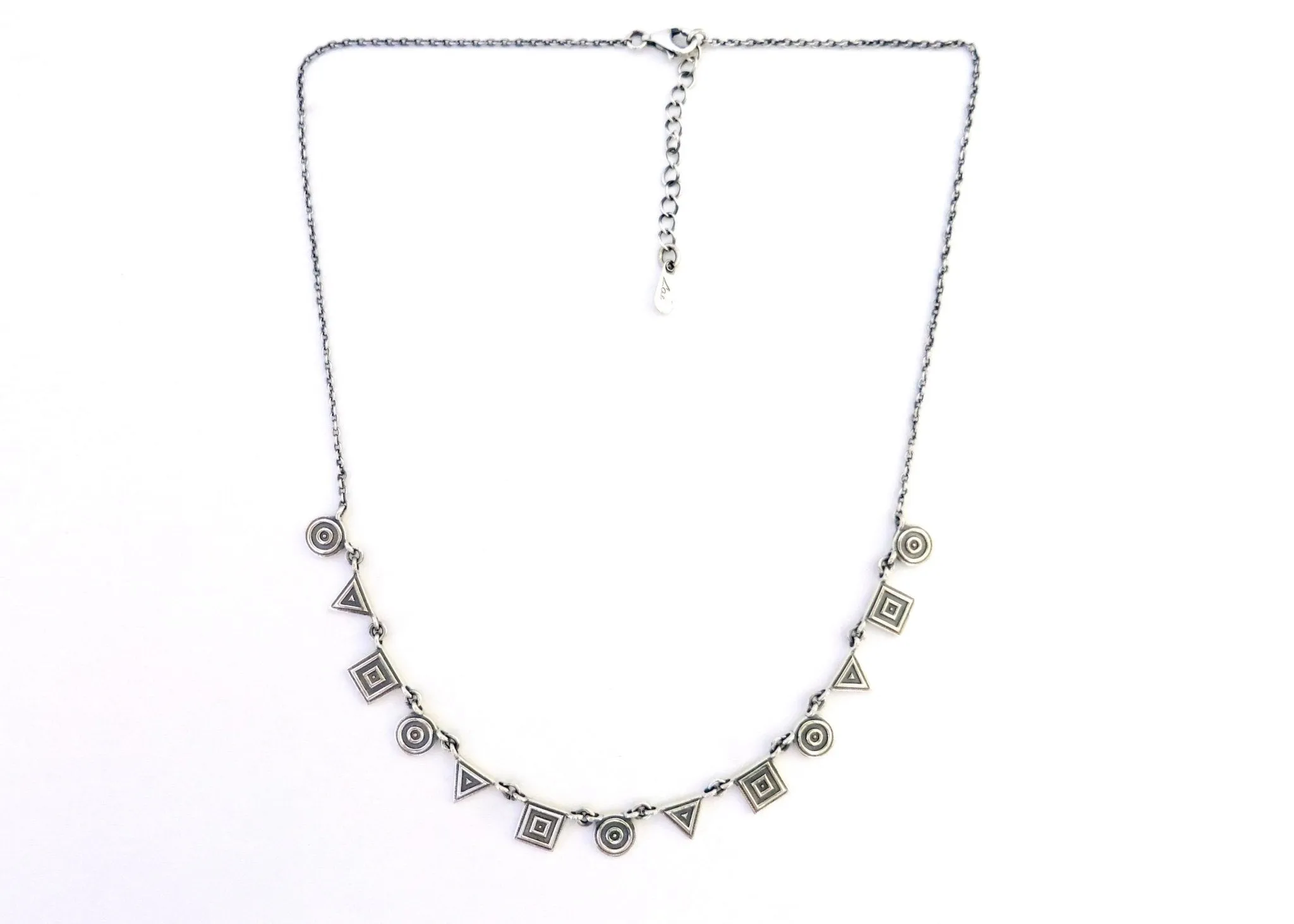 Chic, neo-tribal, geometric medley necklace