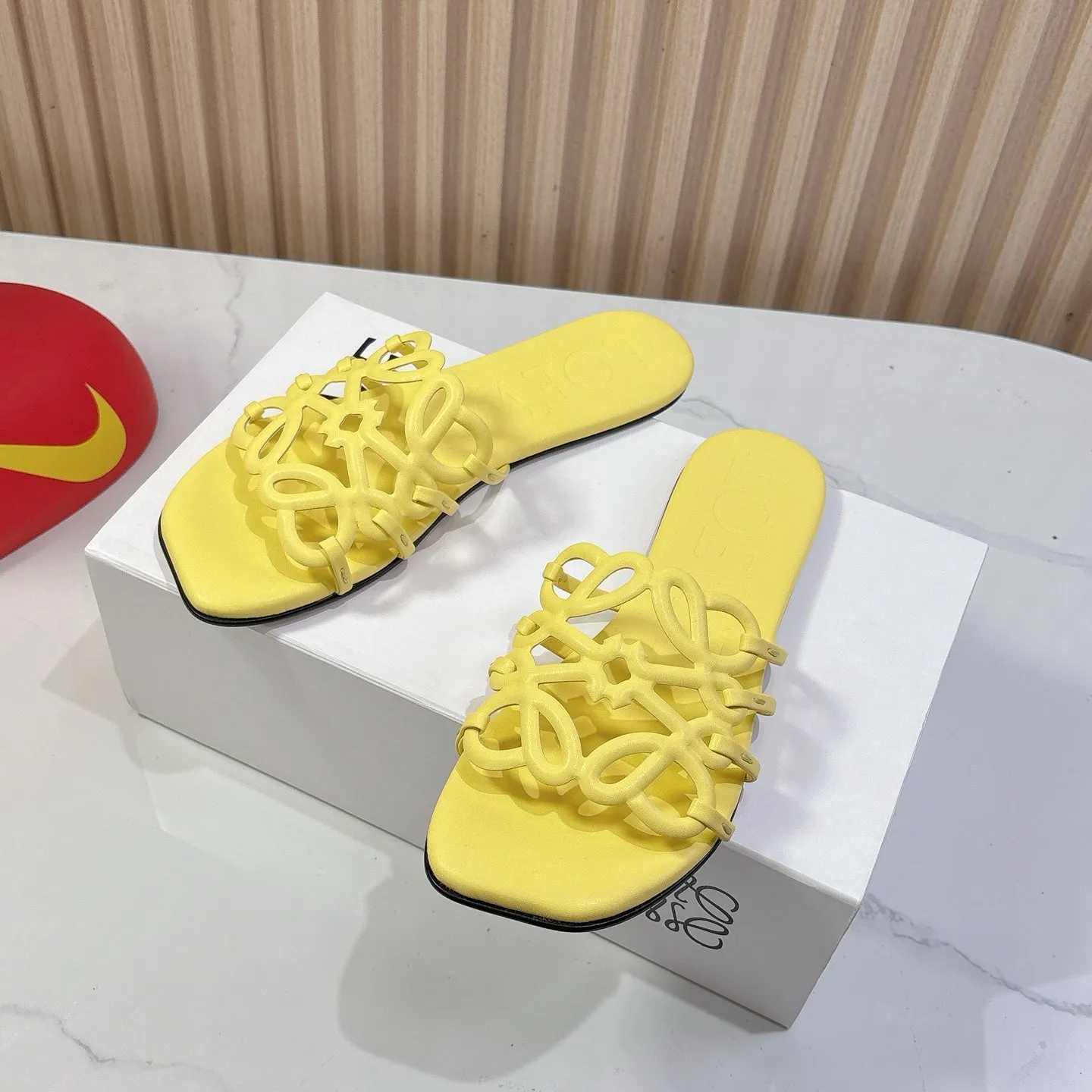 Petal Anagram Slide in Yellow Soft Calfskin 273742