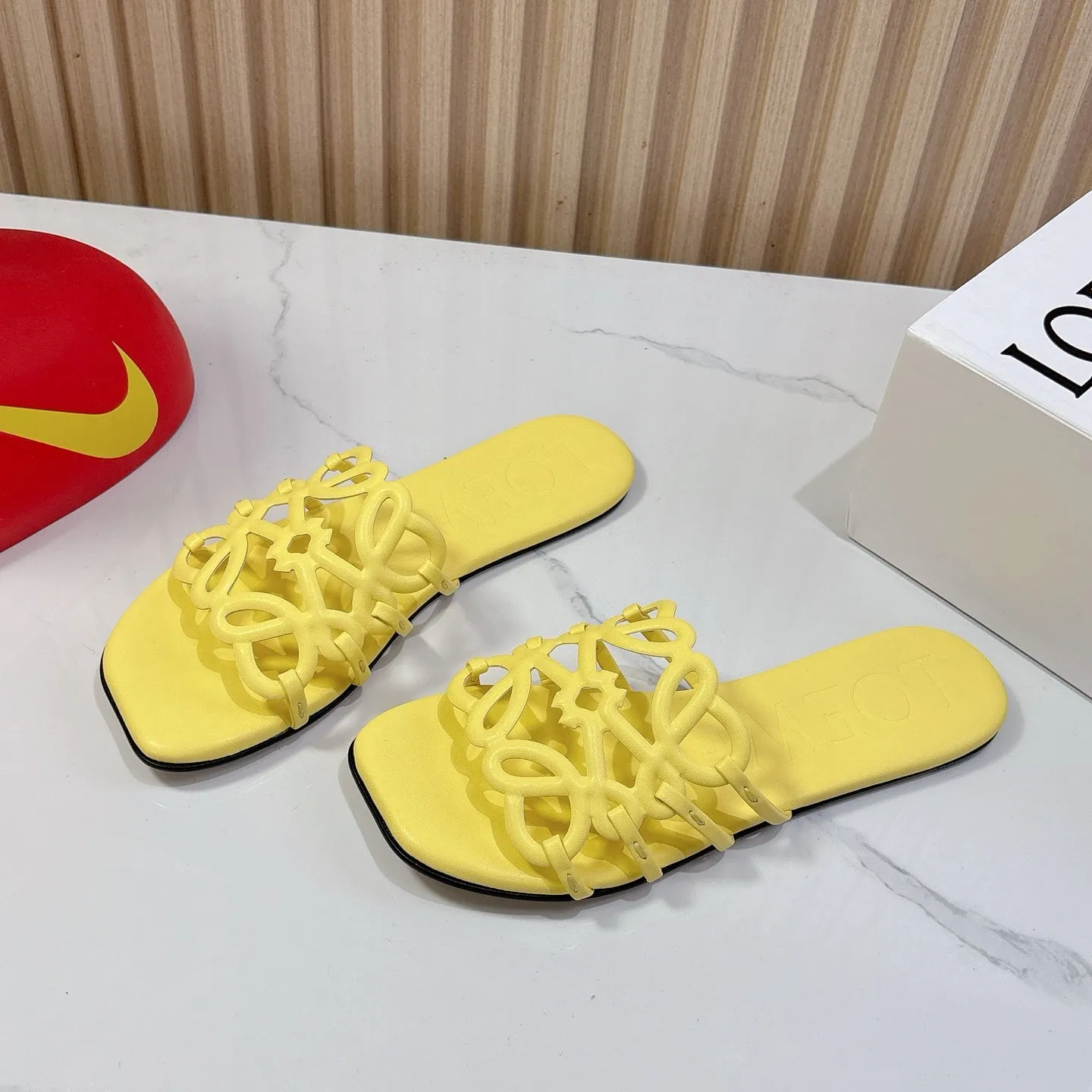 Petal Anagram Slide in Yellow Soft Calfskin 273742