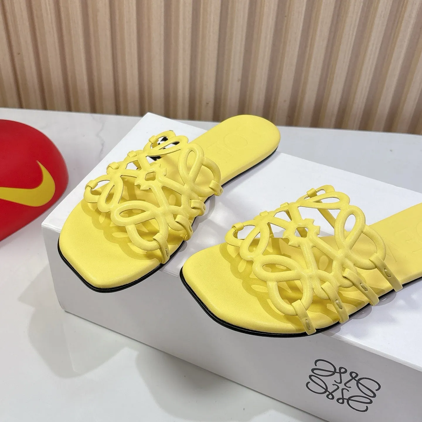 Petal Anagram Slide in Yellow Soft Calfskin 273742